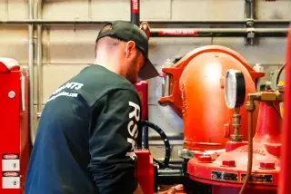 Red Seal technician servicing a fire pump.